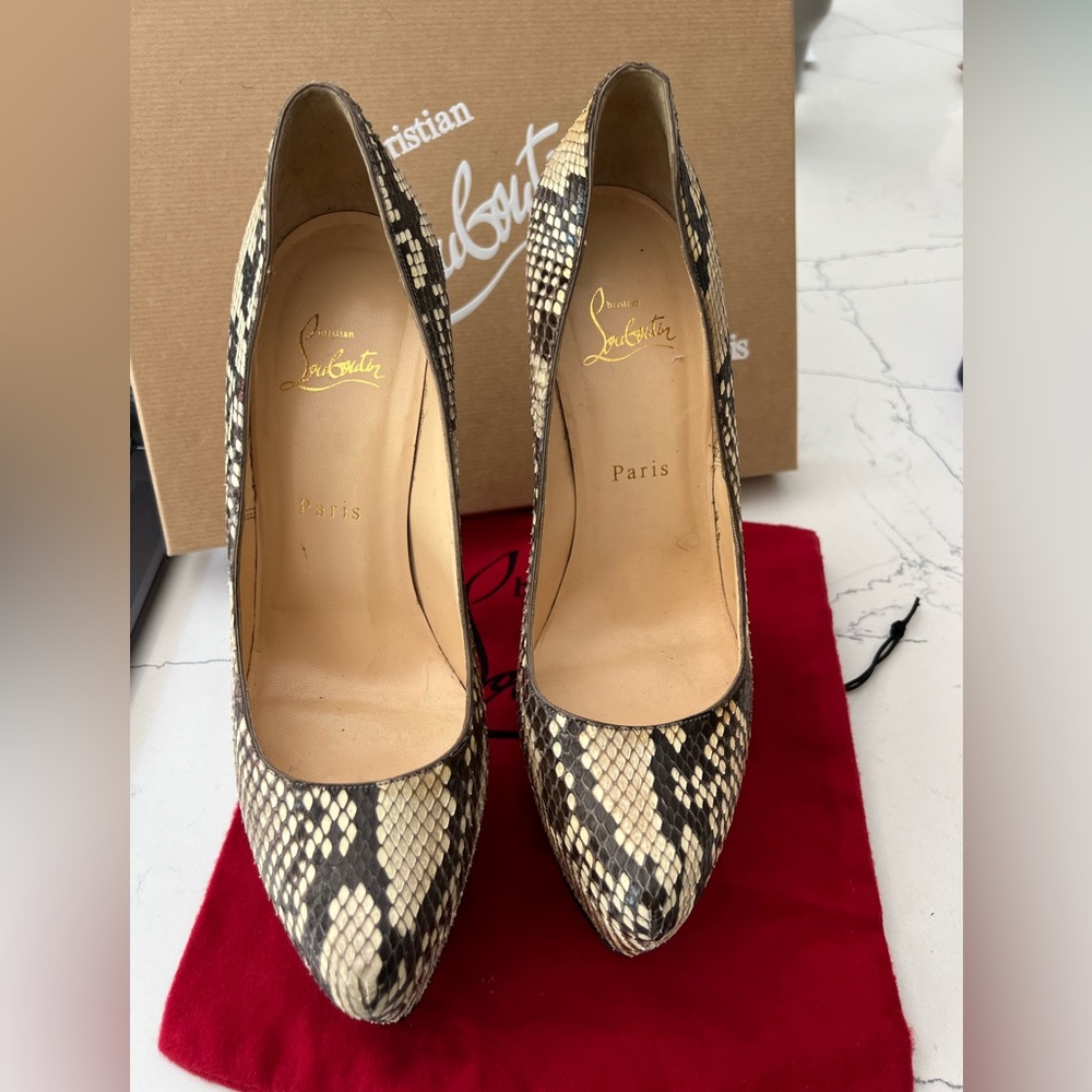 Used Christian Louboutin Python skin  heels